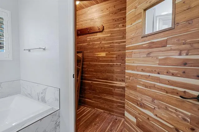 a view of road with large trees