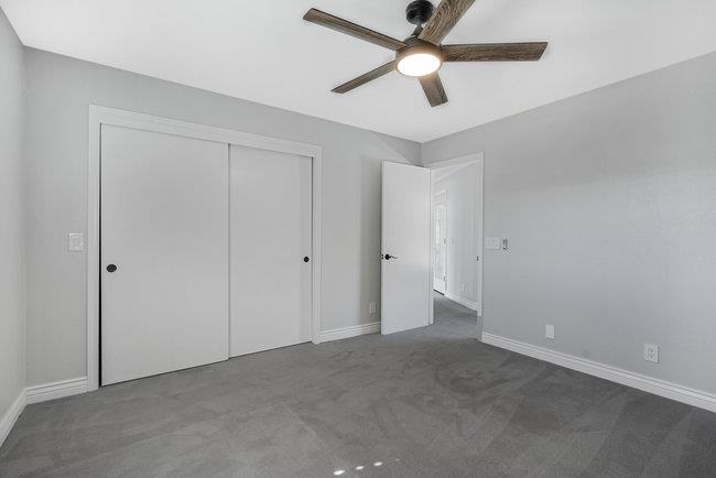 5955 Diablo Hills Road Tres Pinos, CA 95075 - Photo 55 of 91 an empty room with closet and a chandelier fan