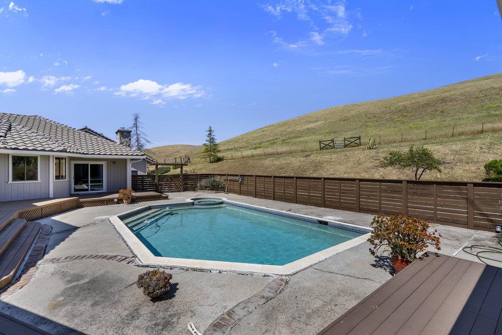 5955 Diablo Hills Road Tres Pinos, CA 95075 - Photo 61 of 91 a view of a swimming pool with a patio