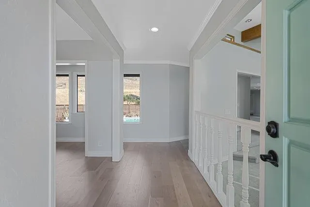 a kitchen with kitchen island granite countertop stainless steel appliances a sink stove and microwave