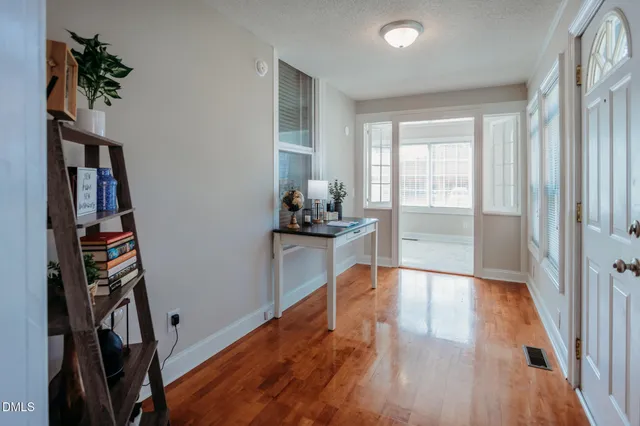 a hallway with wooden floor