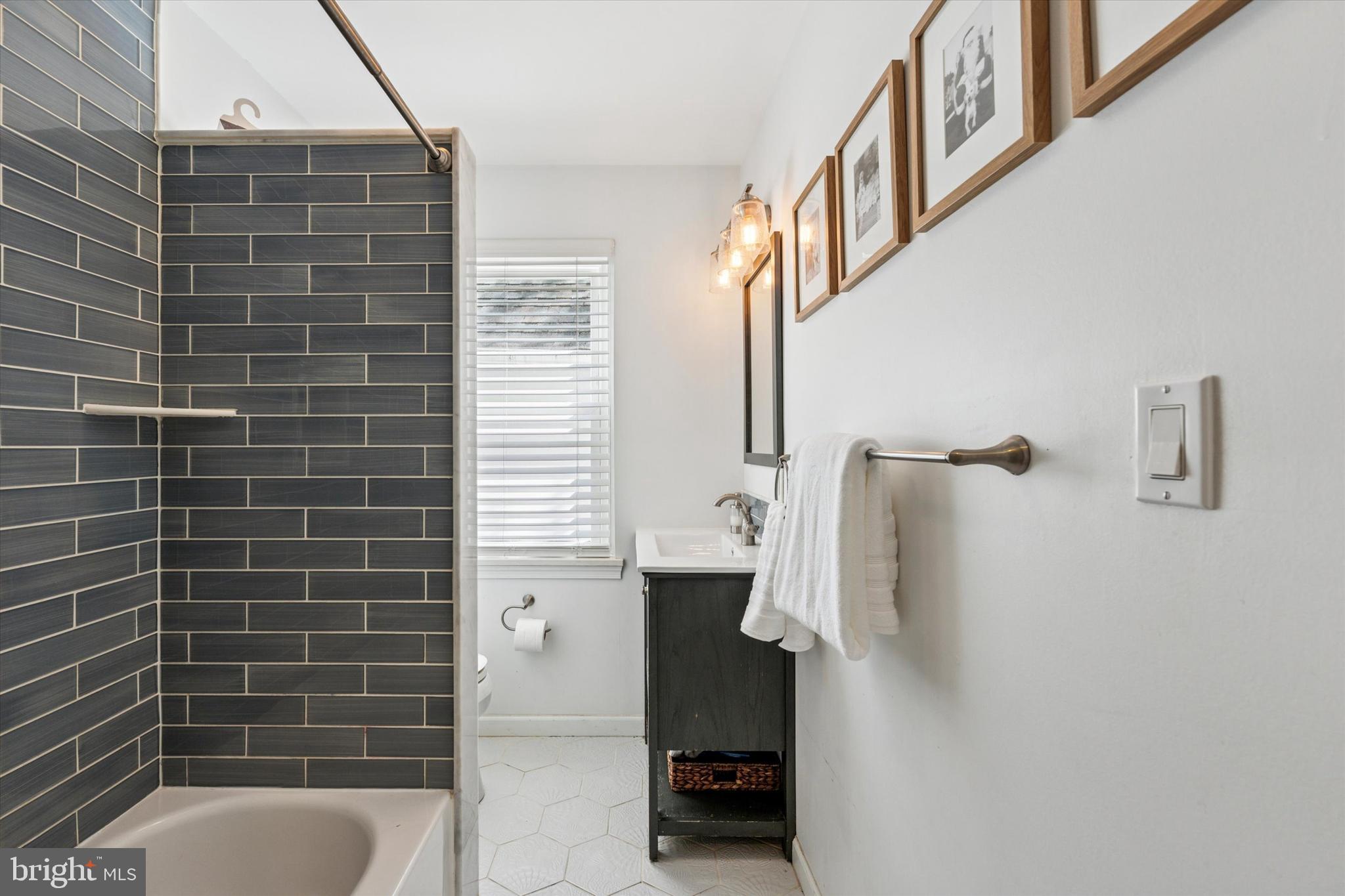 447 Conestoga Road Wayne, PA 19087 - Photo 13 of 22 a bathroom with a toilet and a shower