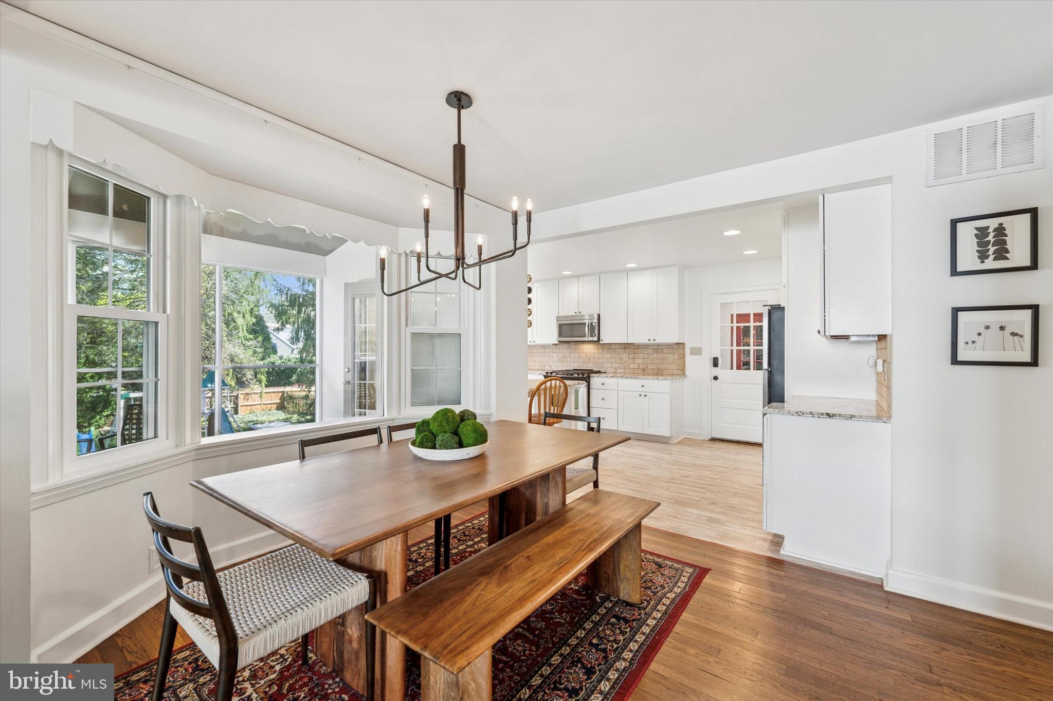 447 Conestoga Road Wayne, PA 19087 - Photo 6 of 22 a view of a dining room with furniture window and wooden floor