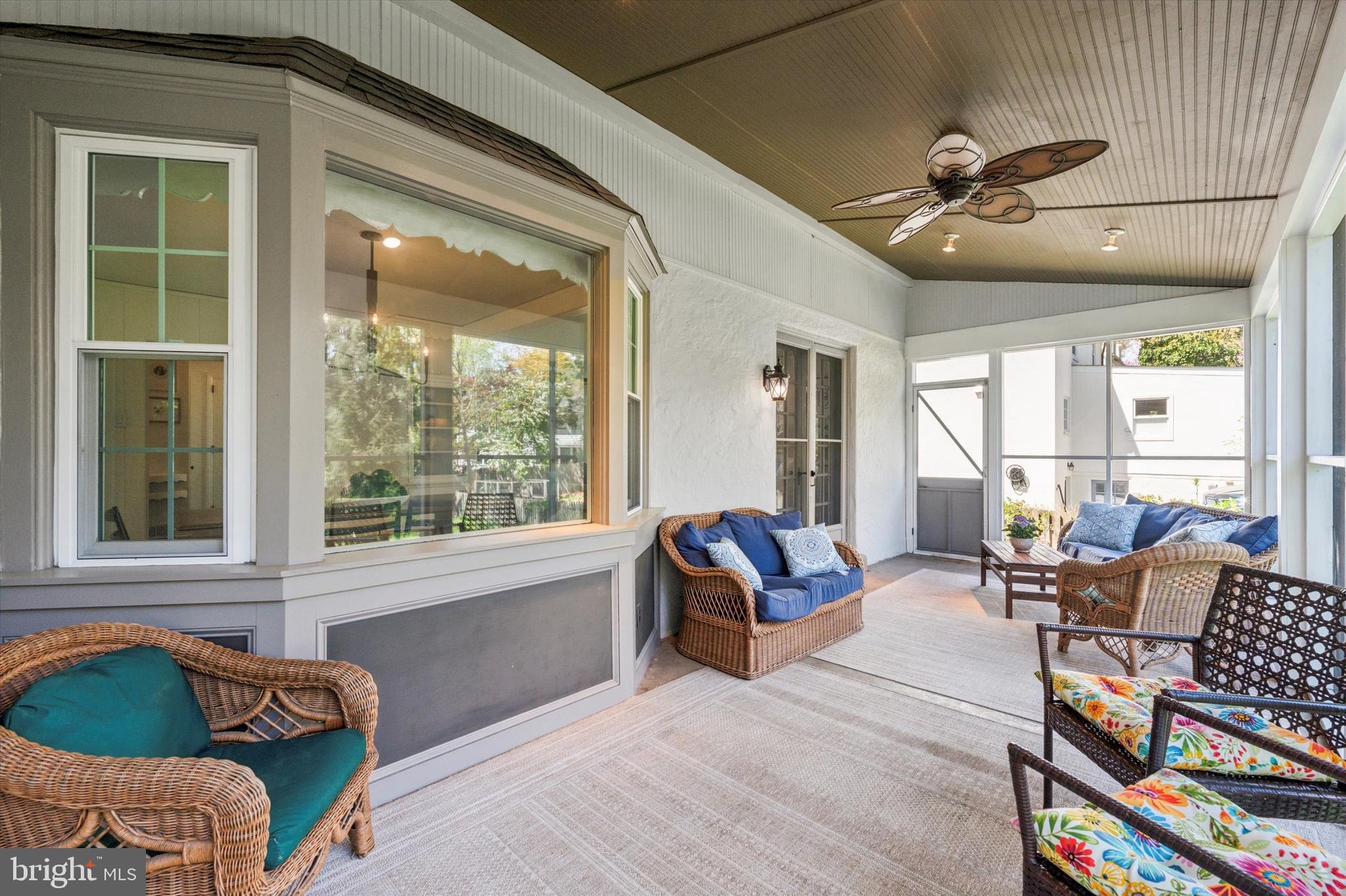 447 Conestoga Road Wayne, PA 19087 - Photo 10 of 22 a living room with furniture and a large window