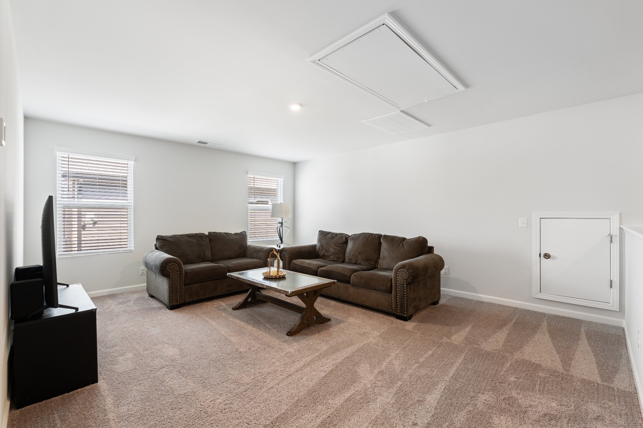 106 Pekka Drive Lebanon, TN 37087 - Photo 15 of 24 a living room with furniture and a flat screen tv