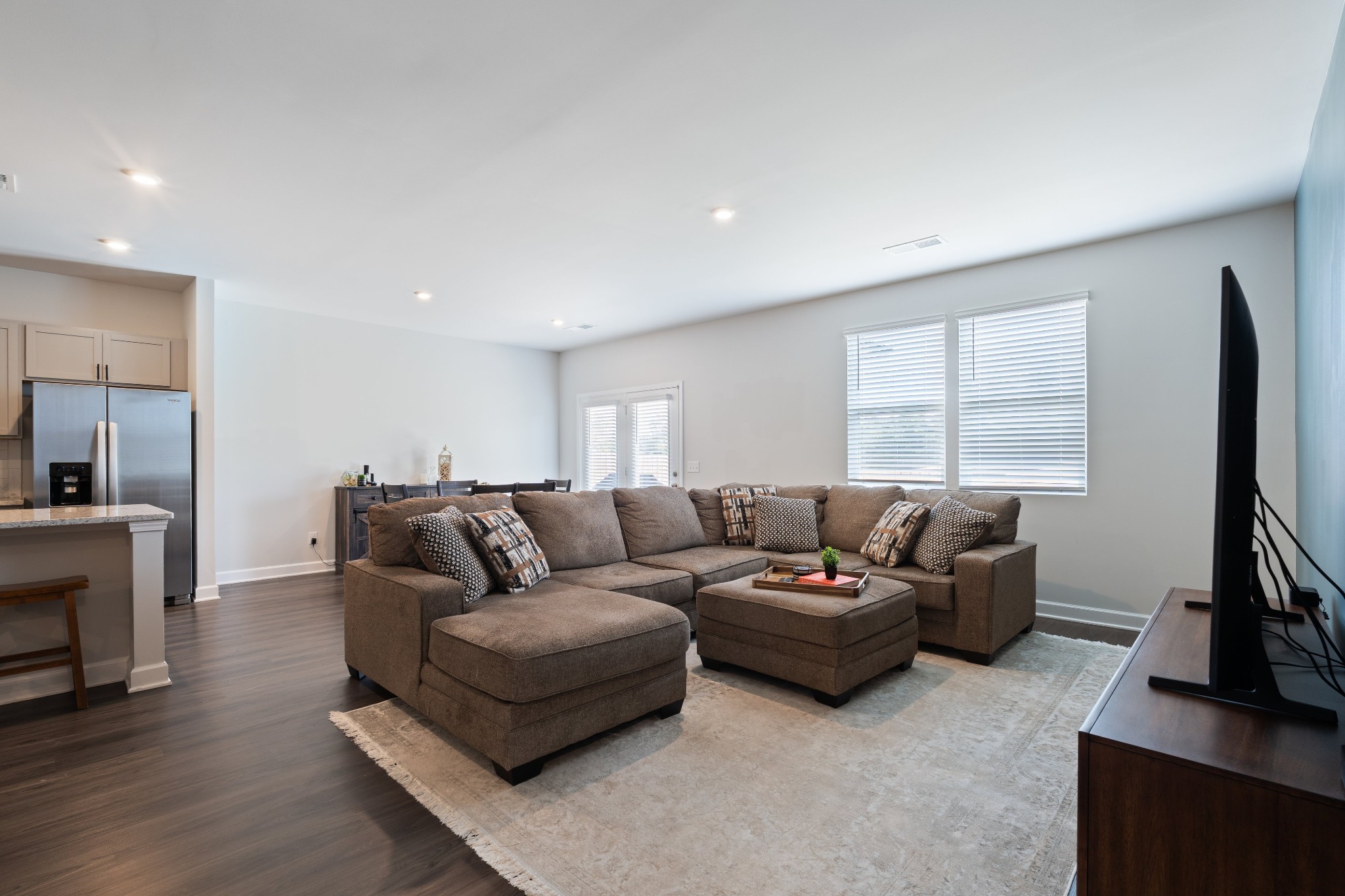 106 Pekka Drive Lebanon, TN 37087 - Photo 7 of 24 a living room with furniture flat screen tv and a fireplace