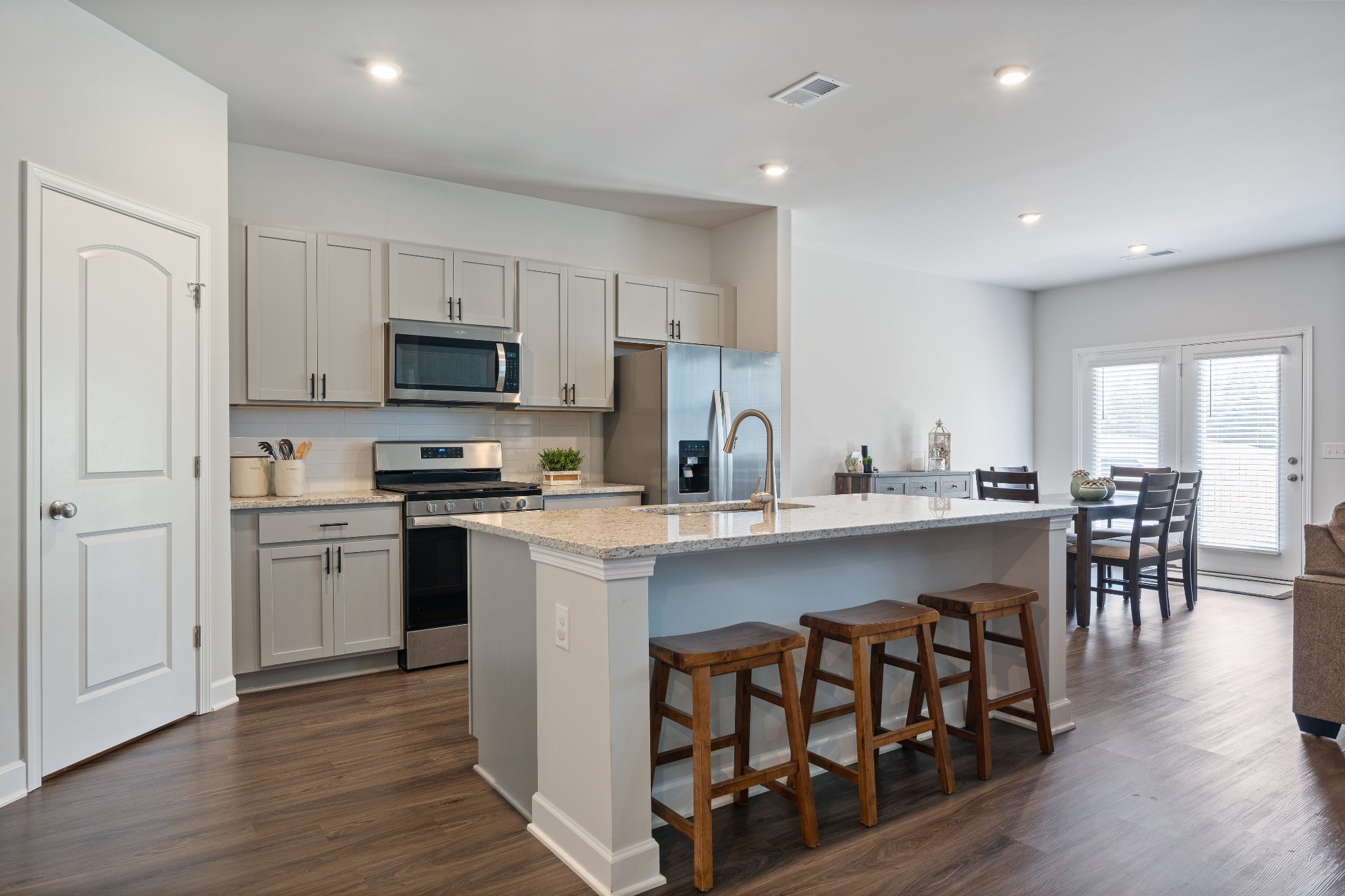 106 Pekka Drive Lebanon, TN 37087 - Photo 9 of 24 a kitchen with appliances a sink and a refrigerator