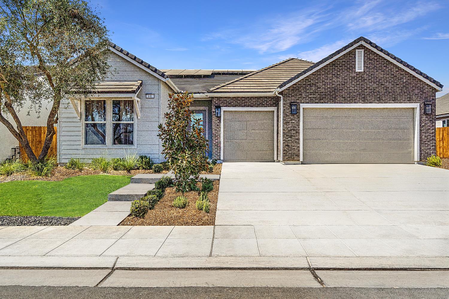 846 Traverse Drive Madera, CA 93636 - Photo 1 of 28 a front view of house with yard