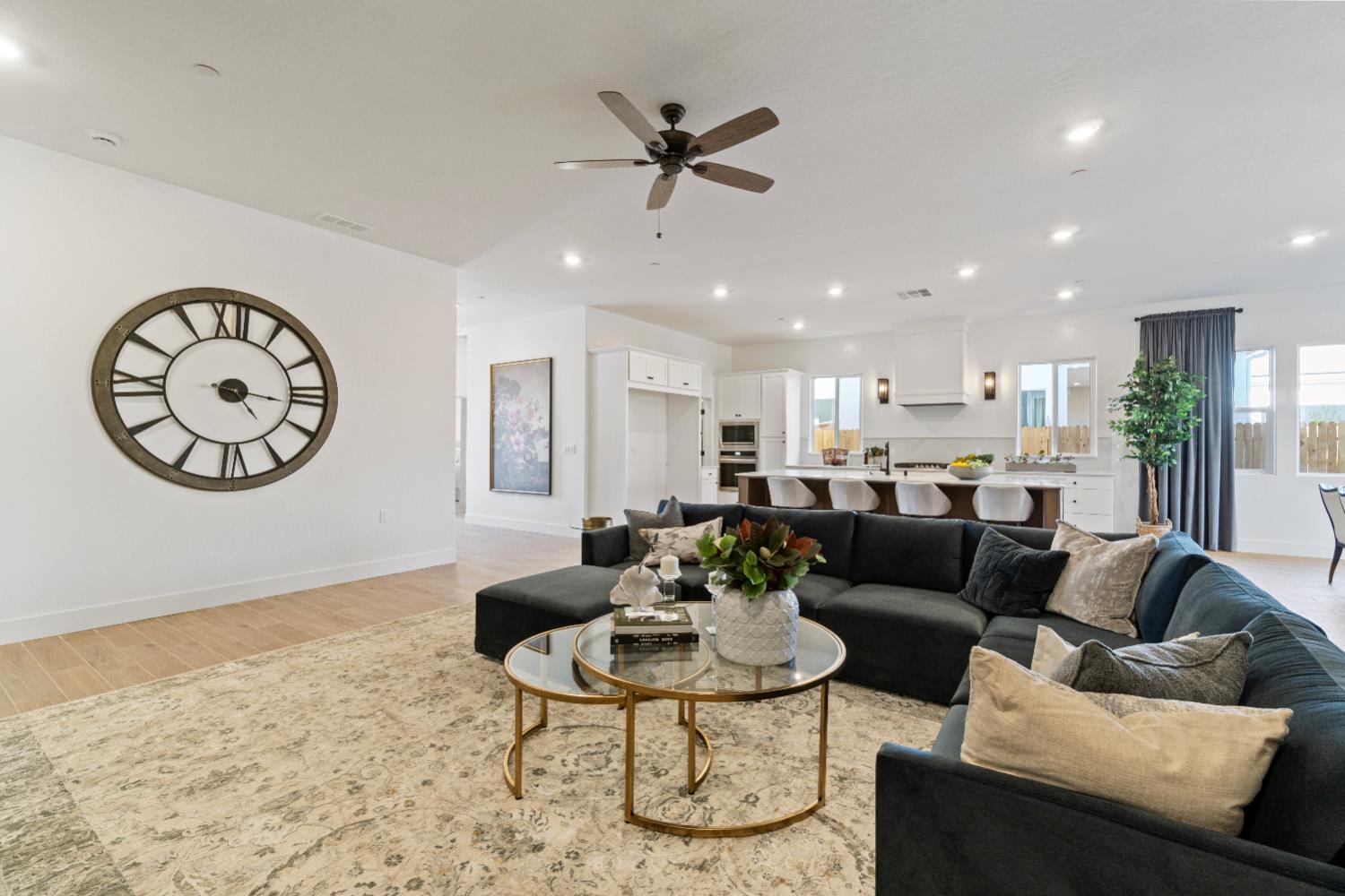 846 Traverse Drive Madera, CA 93636 - Photo 13 of 28 a living room with furniture kitchen view and a window