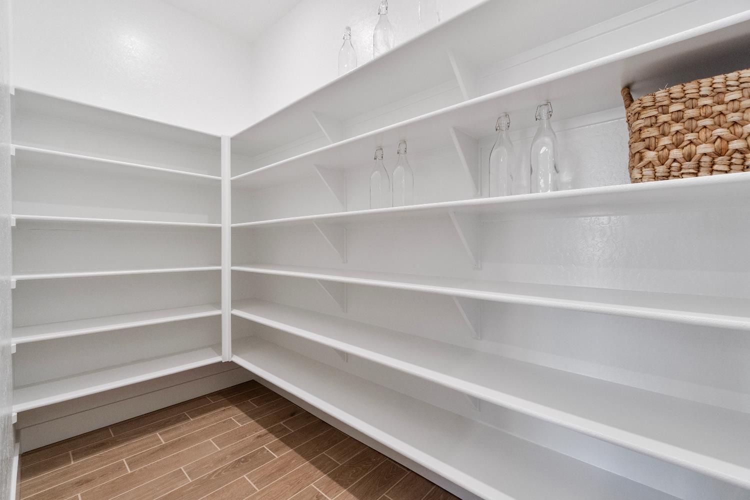 846 Traverse Drive Madera, CA 93636 - Photo 16 of 28 a view of walk in closet with empty racks