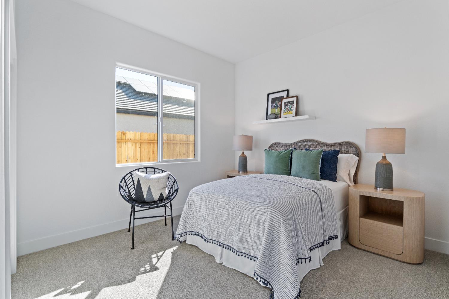 846 Traverse Drive Madera, CA 93636 - Photo 23 of 28 a bedroom with a bed and a window