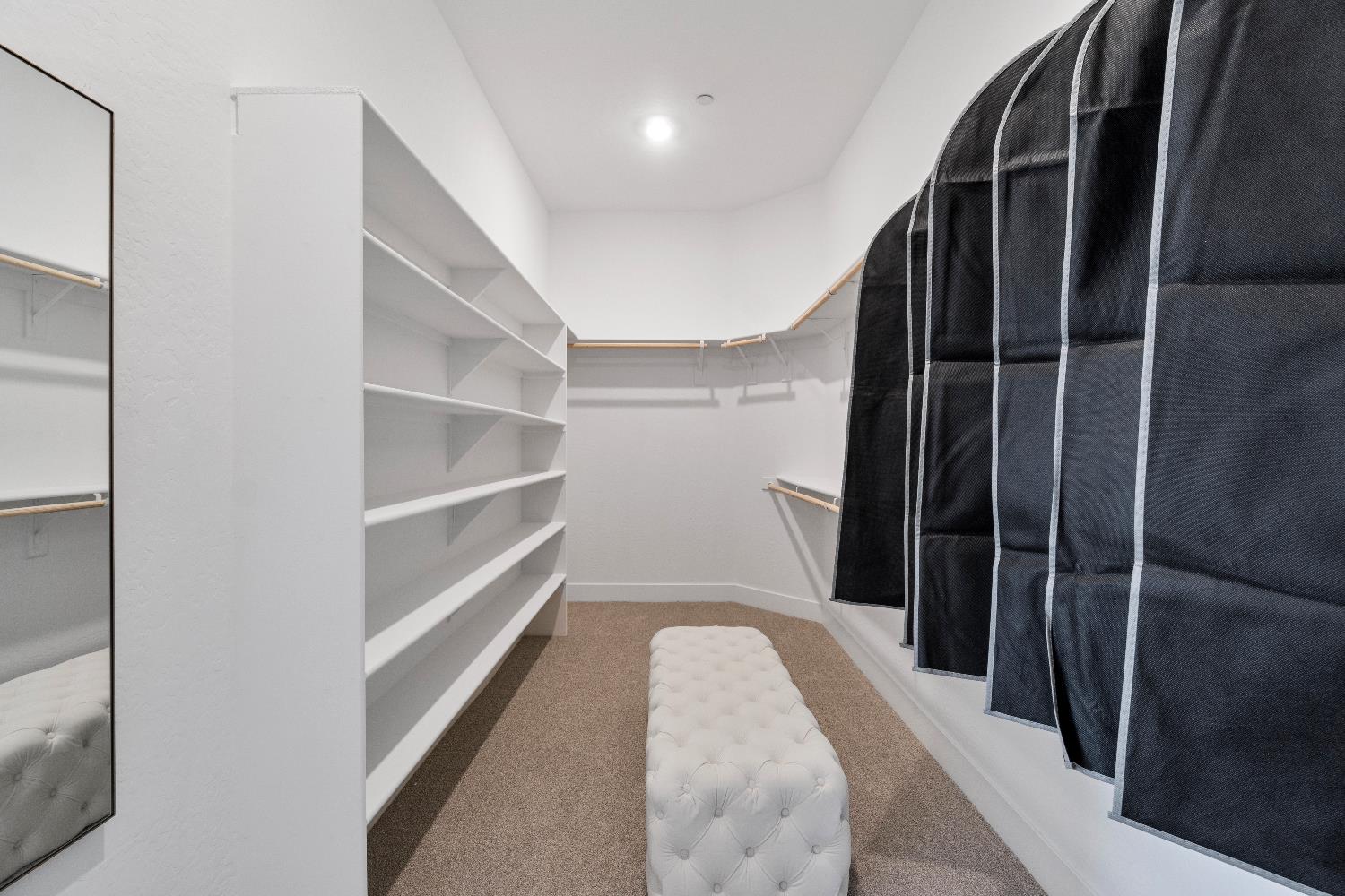 846 Traverse Drive Madera, CA 93636 - Photo 26 of 28 a view of walk in closet with empty racks
