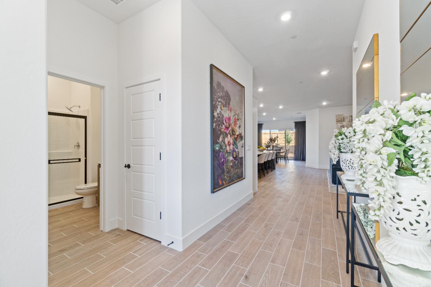 846 Traverse Drive Madera, CA 93636 - Photo 5 of 28 a view of a hallway with wooden floor