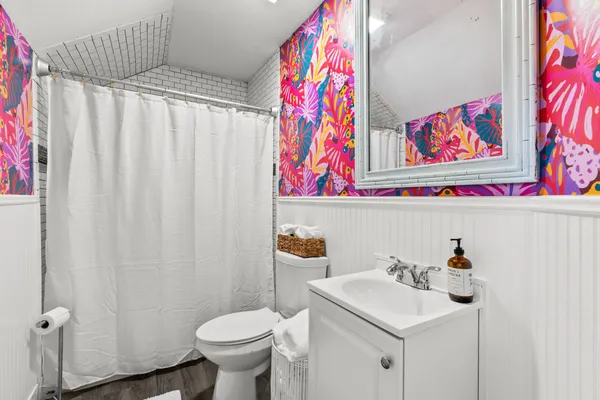 a bathroom with a sink and a toilet