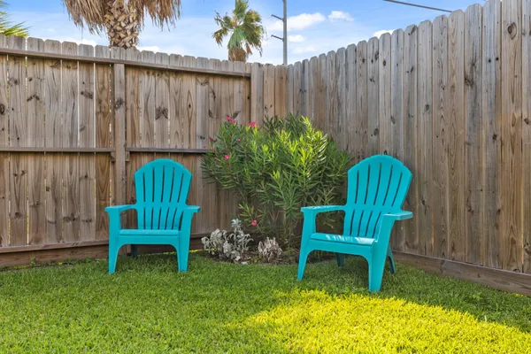 a garden with wooden fence