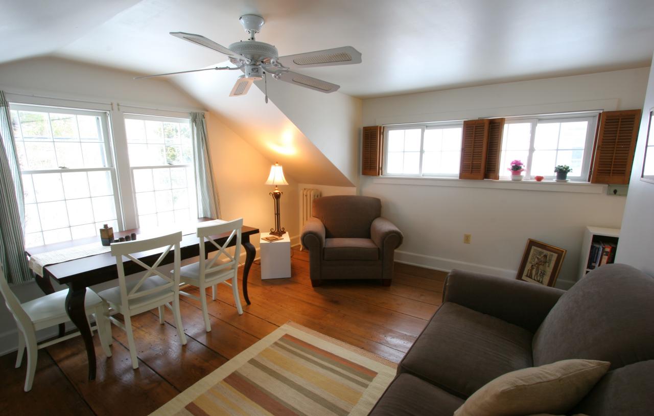 454 Main Road, Unit 8 Monterey, MA 01245 - Photo 8 of 22 a living room with furniture and a large window
