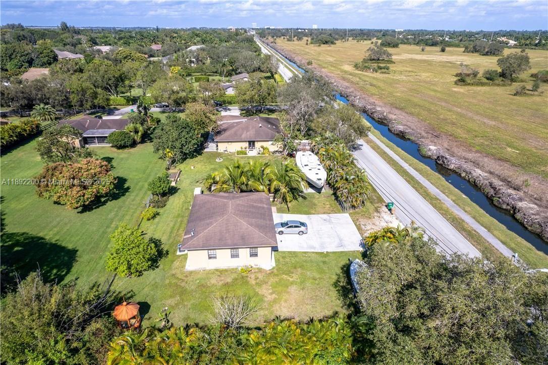 13602 Southwest 24th Street Davie, FL 33325 - Photo 2 of 6 an aerial view of residential houses with outdoor space