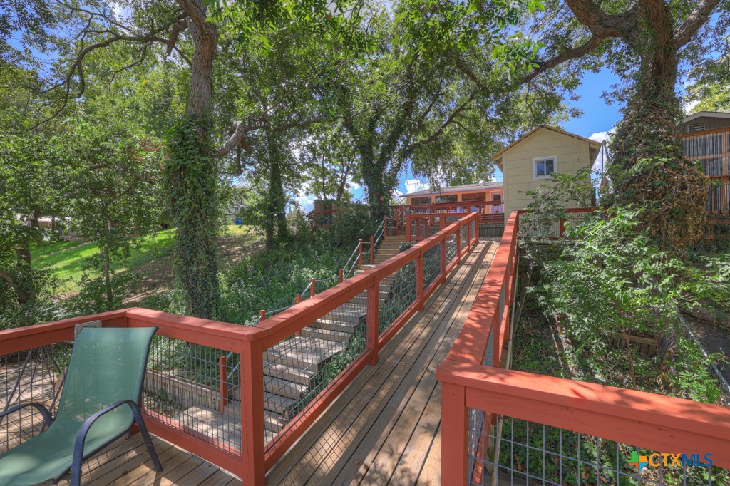 1015 Reiley Road Seguin, TX 78155 - Photo 27 of 41 a balcony with wooden floor and outdoor space