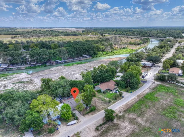 a view of a balcony with mountain view and wooden floor