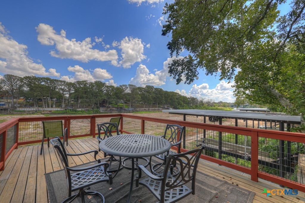 1015 Reiley Road Seguin, TX 78155 - Photo 30 of 41 a view of a chairs and table on the roof deck