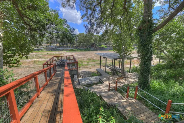 a view of a porch with a backyard