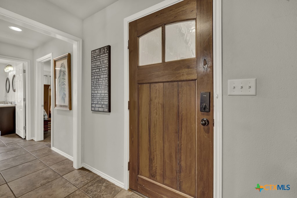 1015 Reiley Road Seguin, TX 78155 - Photo 5 of 41 a view of elevator with hallway