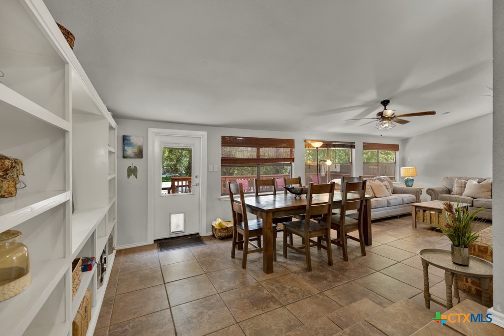 1015 Reiley Road Seguin, TX 78155 - Photo 7 of 41 a view of a dining room with furniture and chandelier