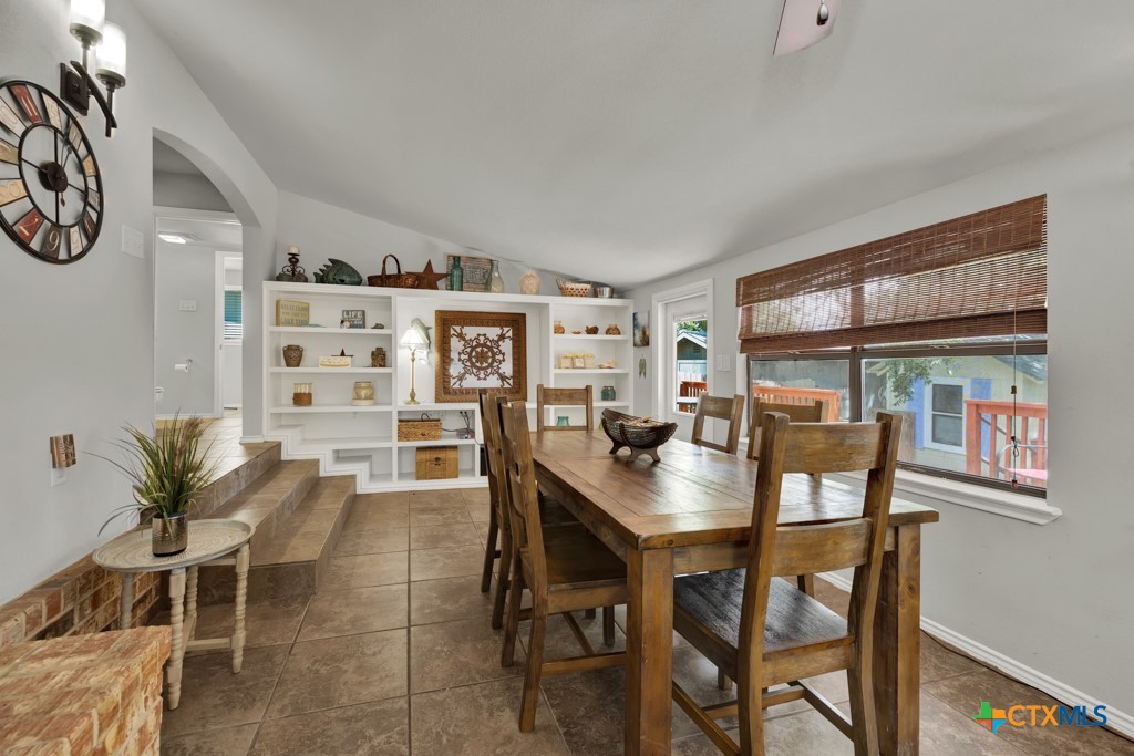 1015 Reiley Road Seguin, TX 78155 - Photo 8 of 41 a dining room with a wooden table and chairs