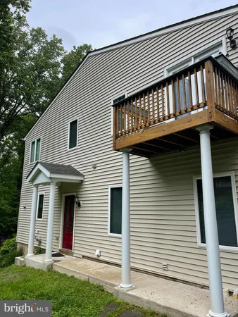 a view of a house with a deck