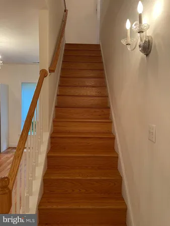 a view of a hallway with staircase