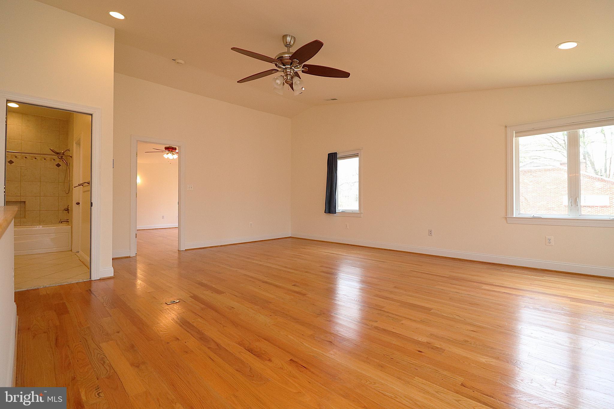 118 Quaint Acres Drive Silver Spring, MD 20904 - Photo 17 of 41 wooden floor in an empty room with a window