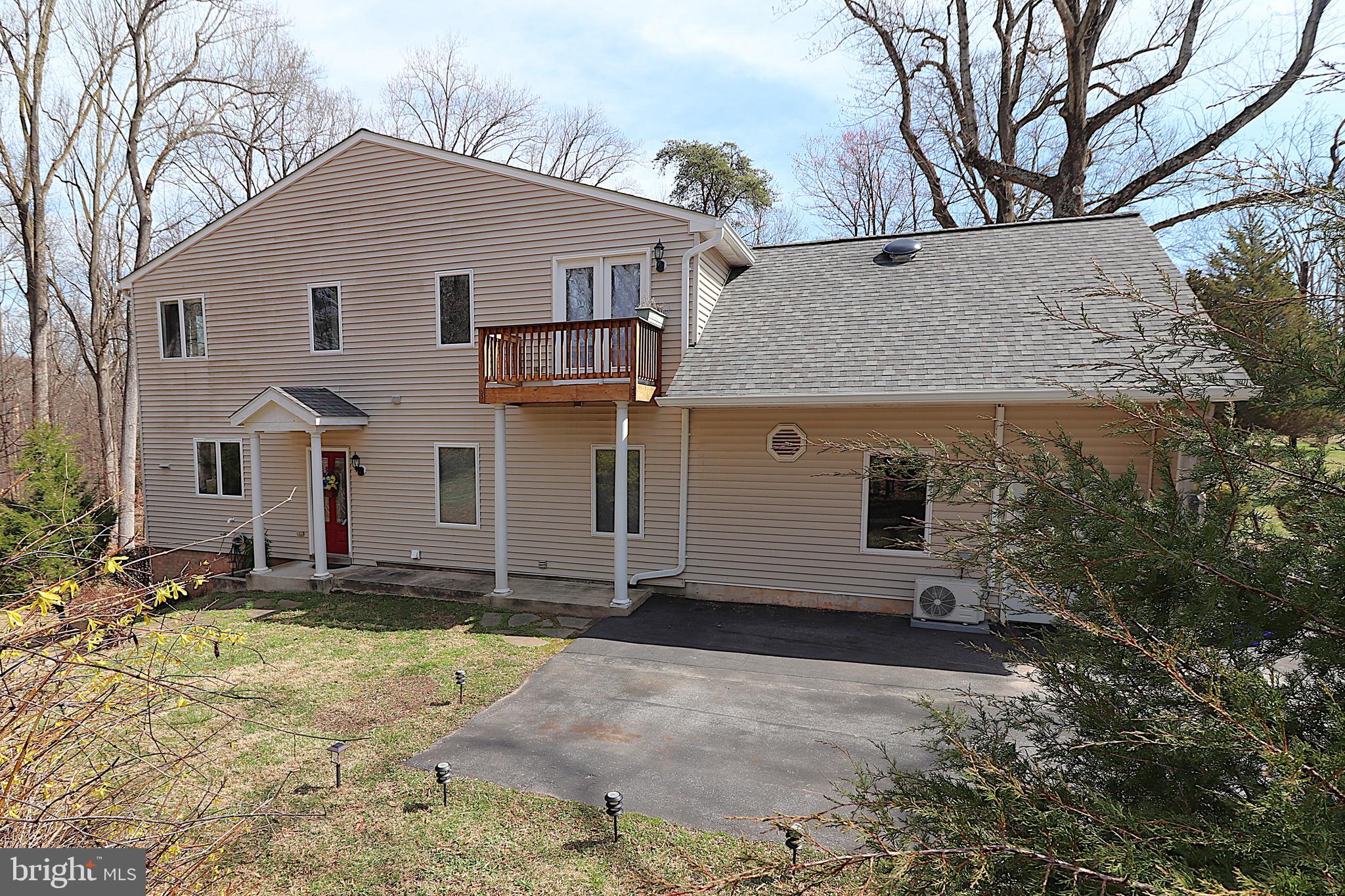 118 Quaint Acres Drive Silver Spring, MD 20904 - Photo 2 of 41 a view of a house with a yard