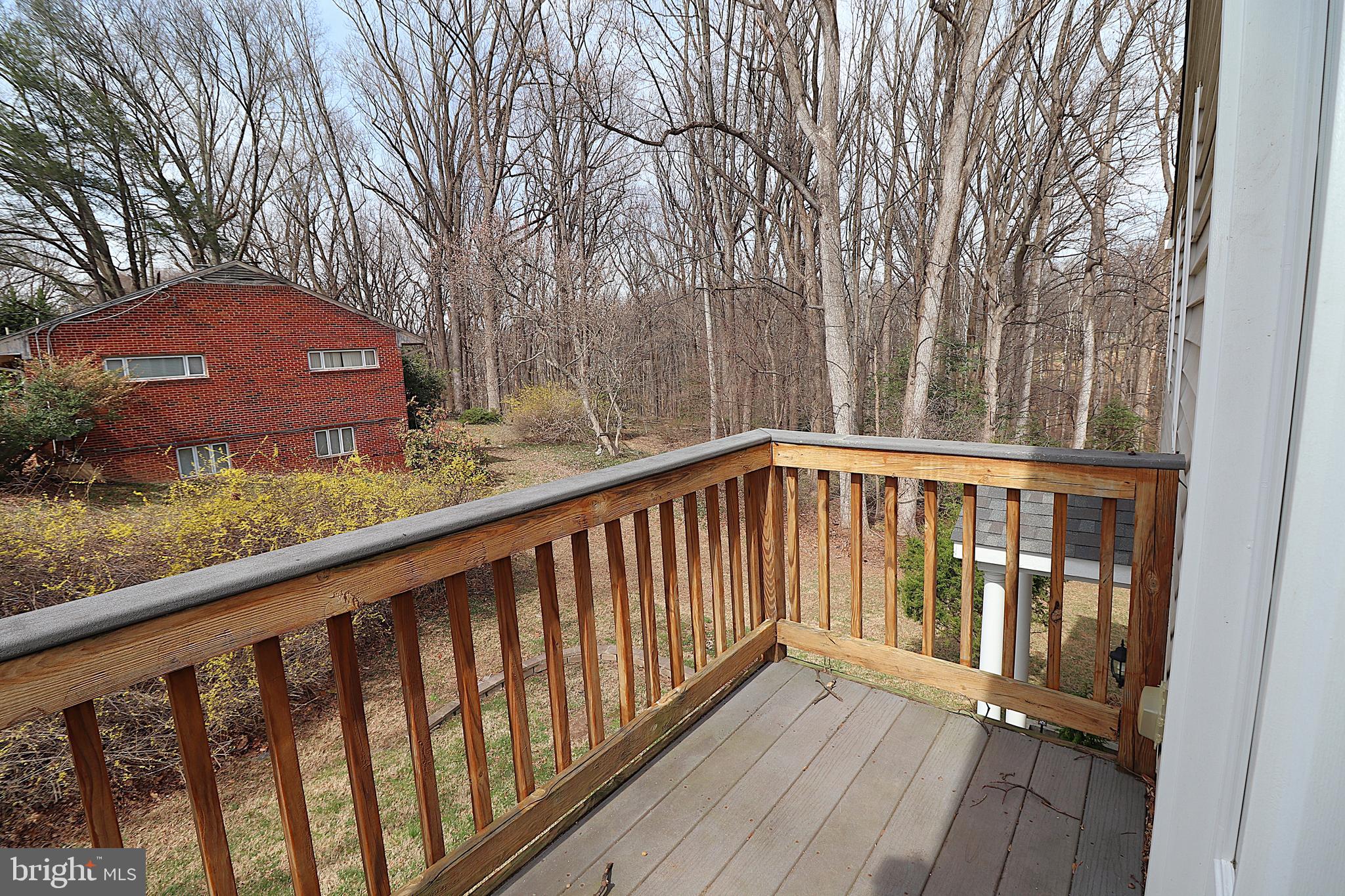 118 Quaint Acres Drive Silver Spring, MD 20904 - Photo 34 of 41 a view of balcony with wooden floor and fence