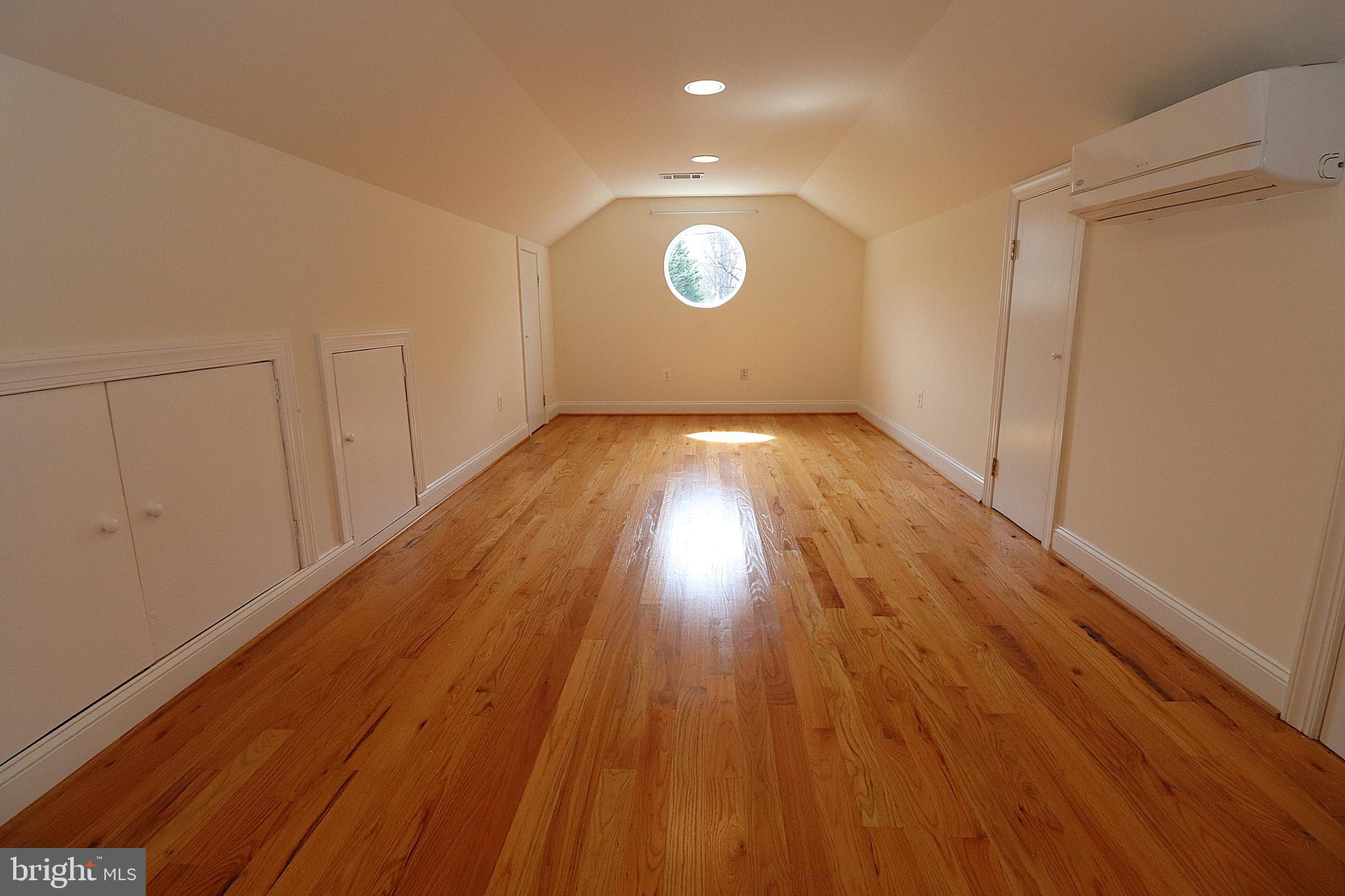 118 Quaint Acres Drive Silver Spring, MD 20904 - Photo 36 of 41 a view of empty room with wooden floor