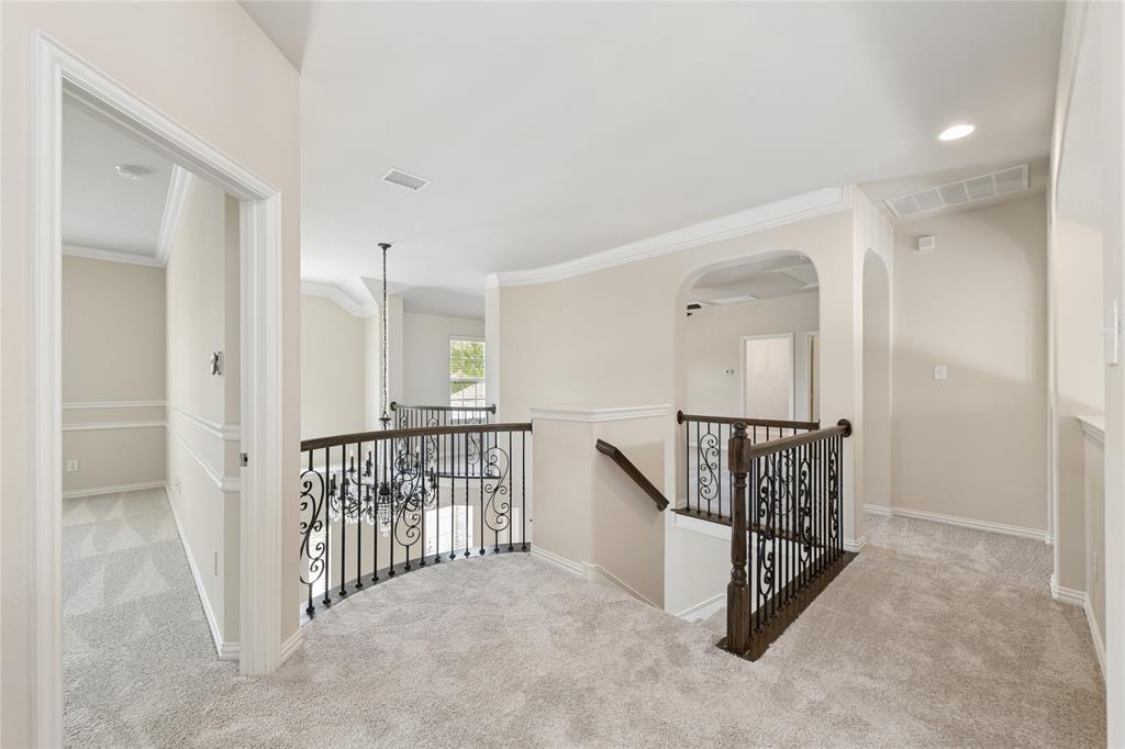 12571 Valley Spring Drive Frisco, TX 75035 - Photo 33 of 39 a view of a hallway with entryway