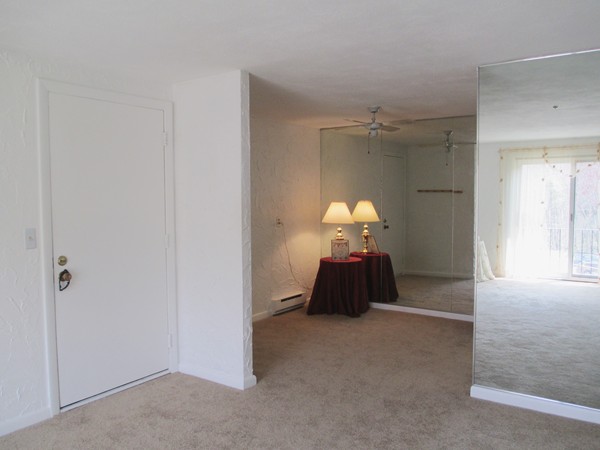 140 Swanson Road, Unit 424 Boxborough, MA 01719 - Photo 3 of 18 a view of a chandelier fan and a closet in a room