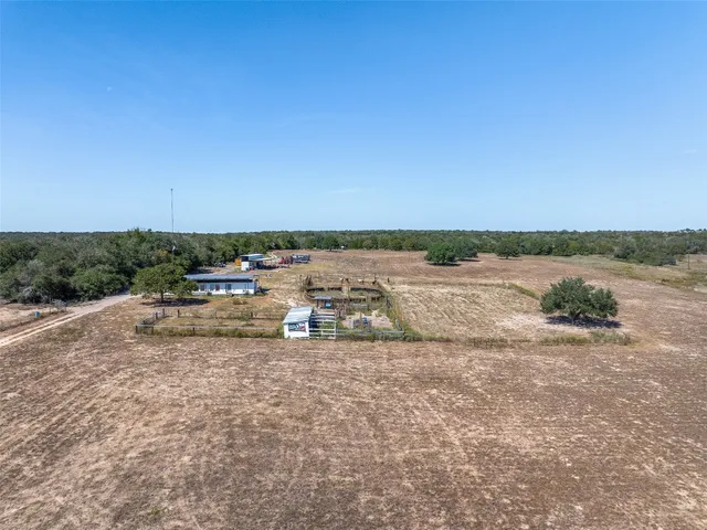 a view of a lake with houses with yard