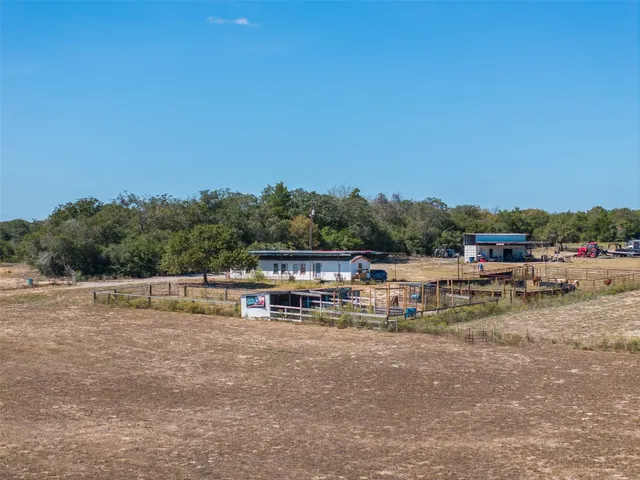 a view of a lake with a yard