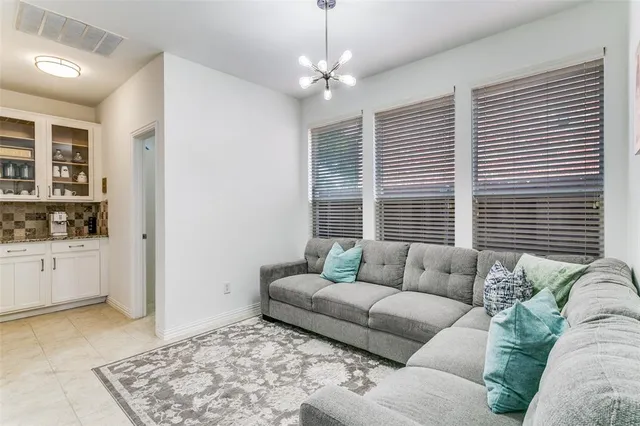 a living room with furniture and window