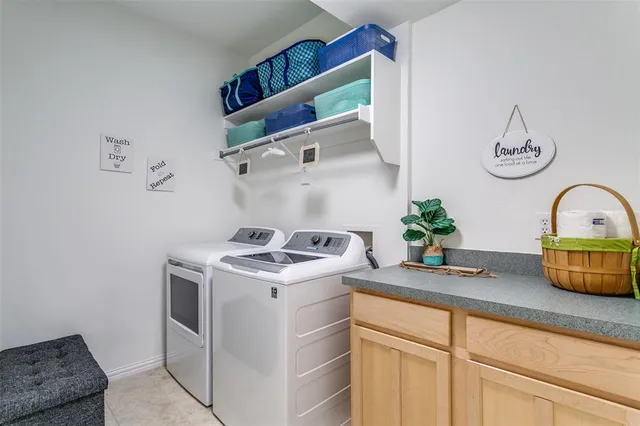 a white stove top oven sitting inside of a kitchen