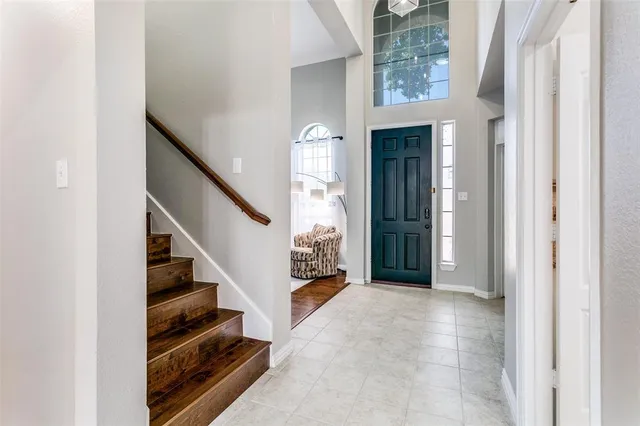 a view of entryway with wooden floor