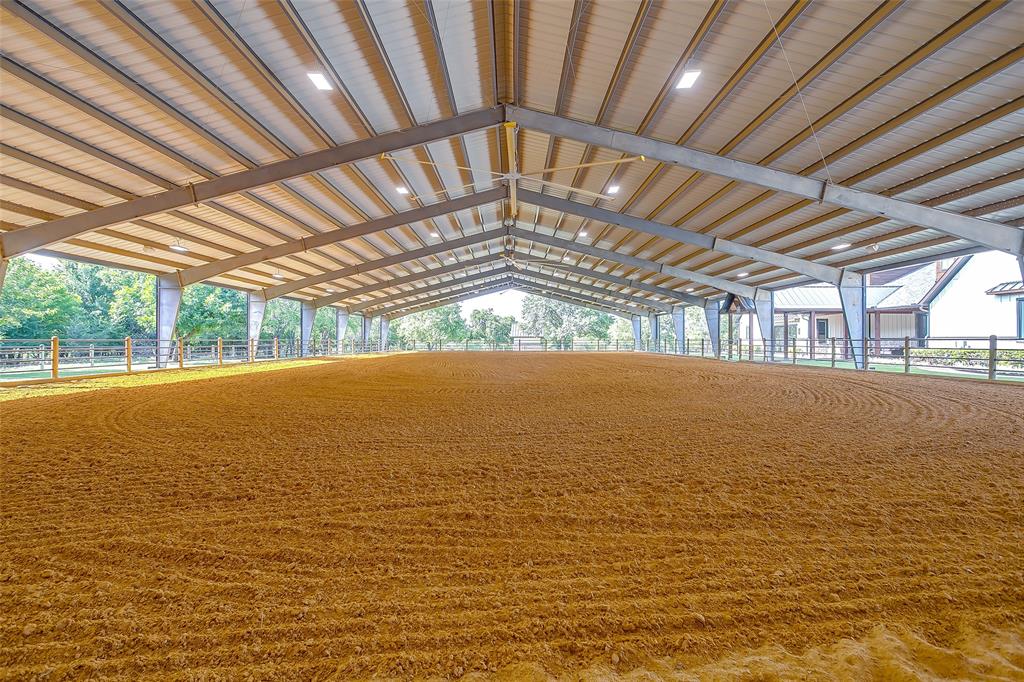 5000 T W King Road Southlake, TX 76092 - Photo 24 of 40 Covered riding arena designed for year-round performance and seamless indoor/outdoor transitions.