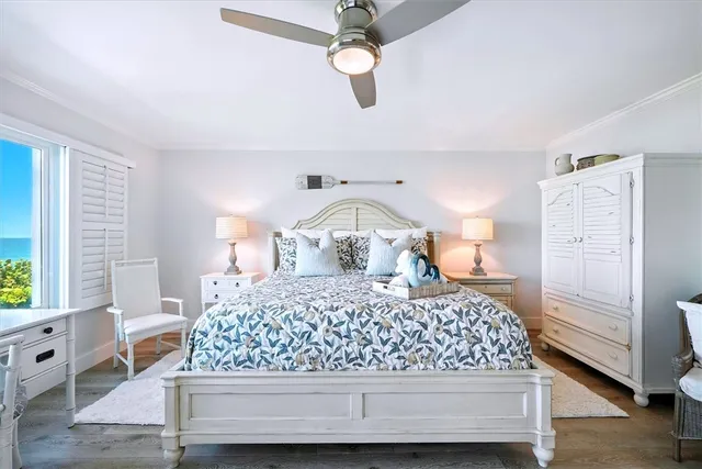 an aerial view of a houses with a yard