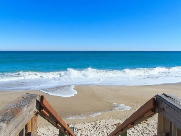 a view of an ocean from a balcony