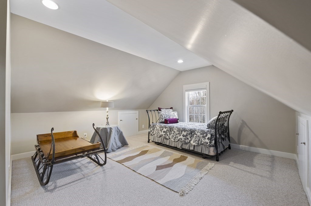 9 Westledge Road Marblehead, MA 01945 - Photo 27 of 30 a living room with furniture and a table