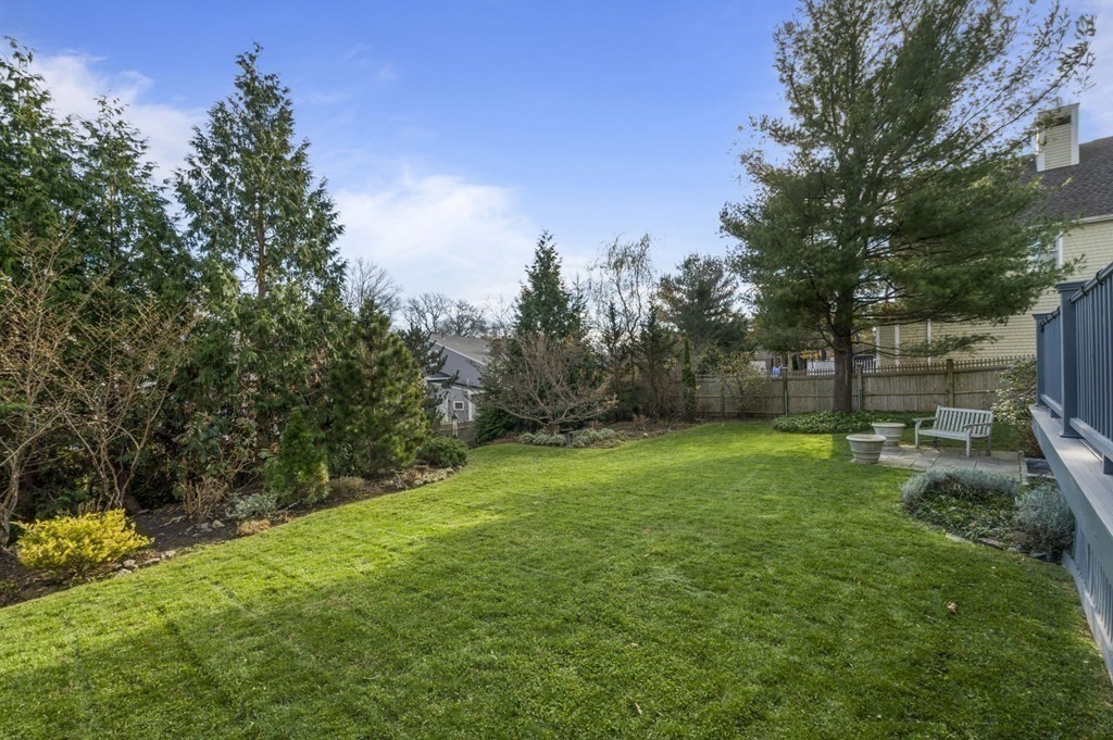 9 Westledge Road Marblehead, MA 01945 - Photo 3 of 30 a view of a backyard with large trees