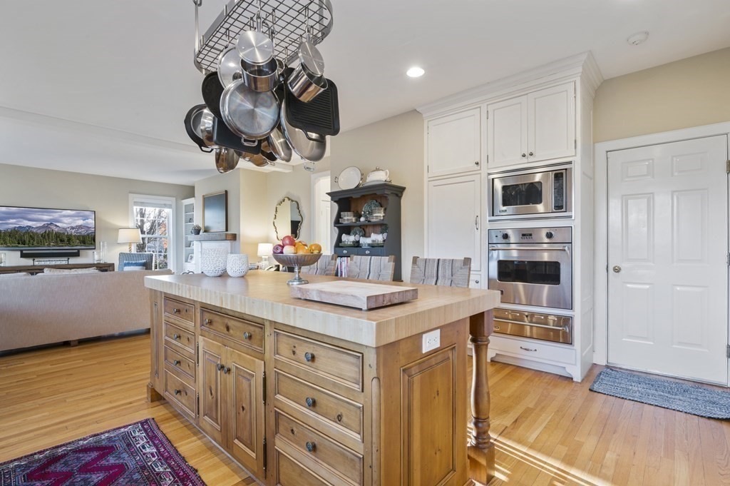 9 Westledge Road Marblehead, MA 01945 - Photo 9 of 30 a kitchen with stainless steel appliances granite countertop a sink a stove and a wooden floors