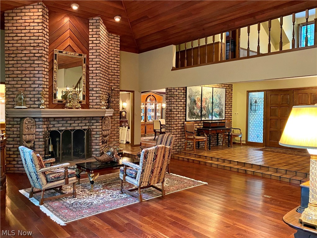 2222 Lancaster Road Akron, OH 44313 - Photo 9 of 35 Stunning two story Great Room also features two-story brick fireplace. This view is toward the Foyer and Dining Room.