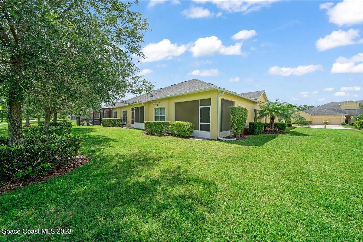 3680 Funston Circle Melbourne, FL 32940 - Photo 28 of 48 a view of a house with a yard