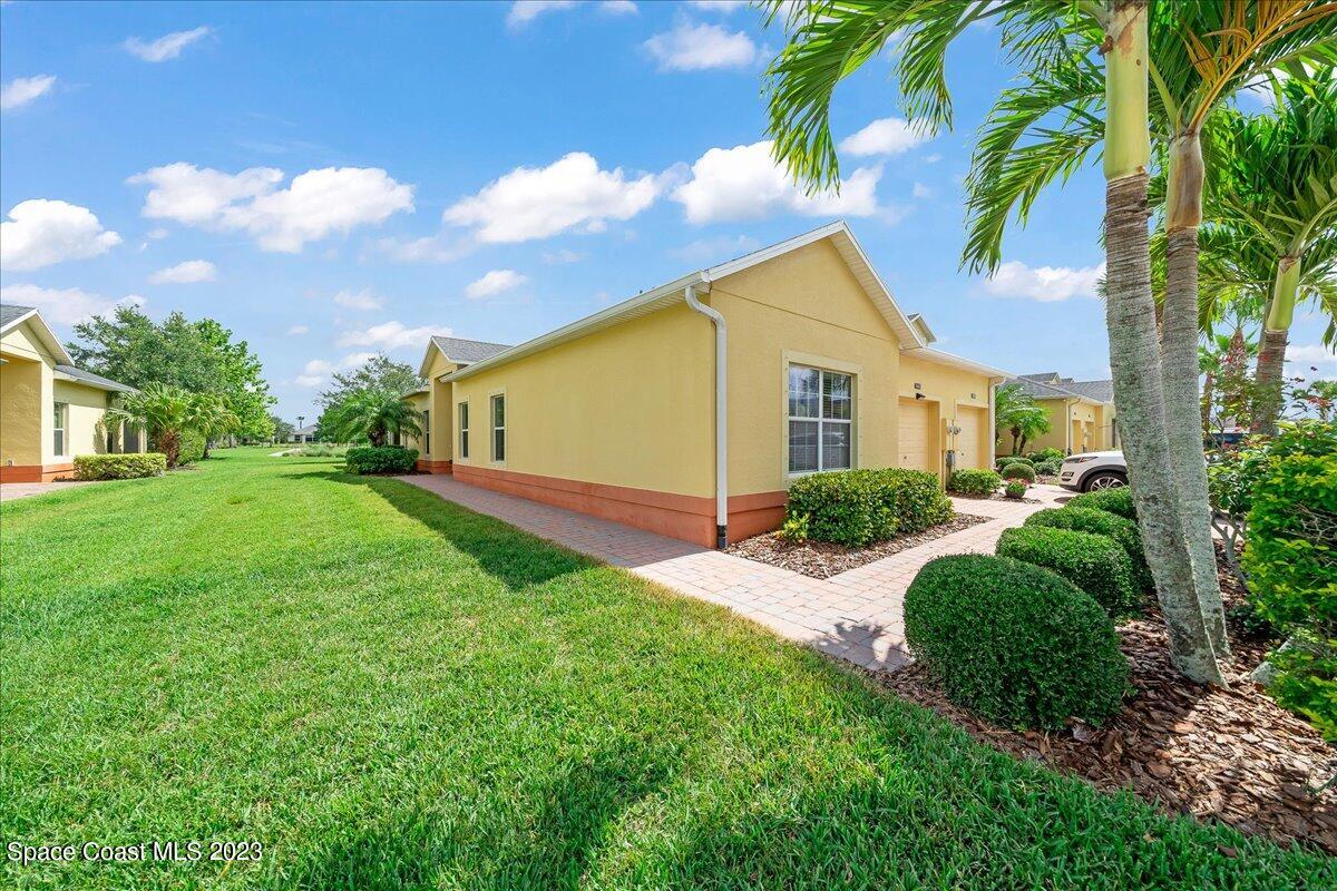 3680 Funston Circle Melbourne, FL 32940 - Photo 30 of 48 a view of backyard with a garden and plants